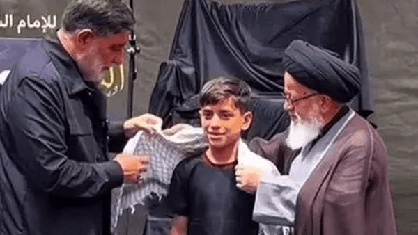 تجلیل از نوجوان عراقی که تصویرش در تشییع رهبر شهید جهانی شد